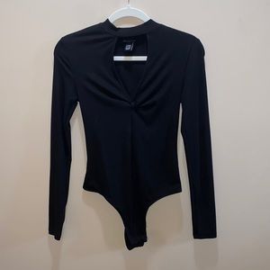 Black bodysuit with neck cutout